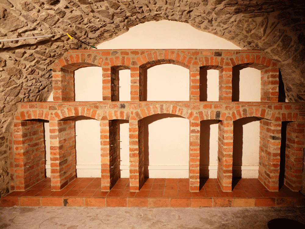 beuttenmueller-natursteinmauer-weinregal_01